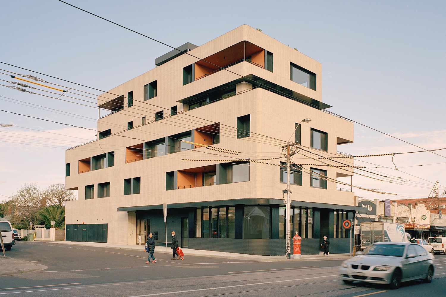 Australian Condominium Reveals How Single Stairs Make Small Buildings Greater